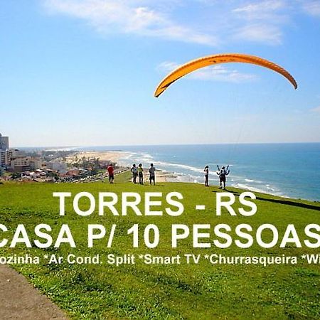 Casa De 2 Quartos Com 2 Ares-Condicionados Em Torres-Rs - Na Mais Bela Praia Gaucha - Cozinha - Banheiro - Tv Smart 32 E Wi-Fi - Estacionamento - Anfitria Superhost No Bnb Villa Bagian luar foto