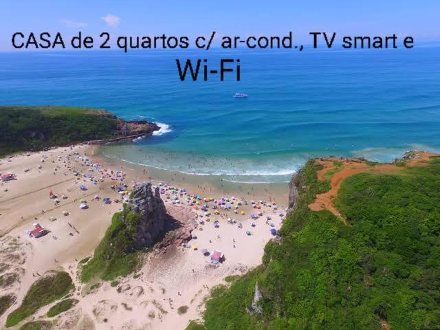 Casa De 2 Quartos Com 2 Ares-Condicionados Em Torres-Rs - Na Mais Bela Praia Gaucha - Cozinha - Banheiro - Tv Smart 32 E Wi-Fi - Estacionamento - Anfitria Superhost No Bnb Villa Bagian luar foto
