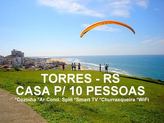 Casa De 2 Quartos Com 2 Ares-Condicionados Em Torres-Rs - Na Mais Bela Praia Gaucha - Cozinha - Banheiro - Tv Smart 32 E Wi-Fi - Estacionamento - Anfitria Superhost No Bnb Villa Bagian luar foto